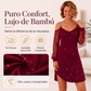 Vestido elegante de mujer con hombros al descubierto y mangas de malla
